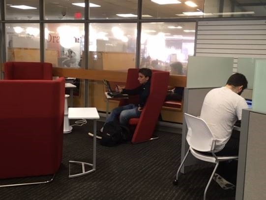 students sit at new study carrels in the Hagerty Library